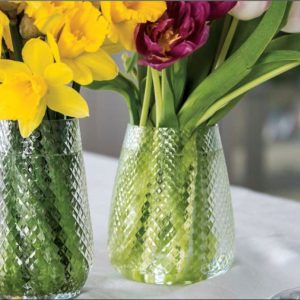 Hand-cut glass flower vase. Classic glass vase with a contemporary diamond cut effect.