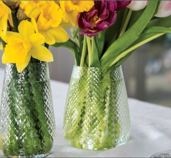 Hand-cut glass flower vase. Classic glass vase with a contemporary diamond cut effect.