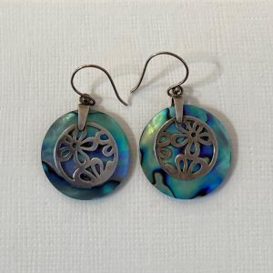 Beautiful earrings featuring a colourful circle of abalone overlaid with flowers handcrafted from sterling silver