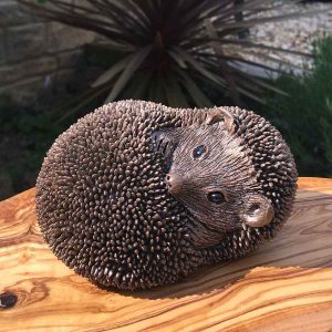 Spike Hedgehog relaxing frith bronze cast sculpture by Thomas Meadows