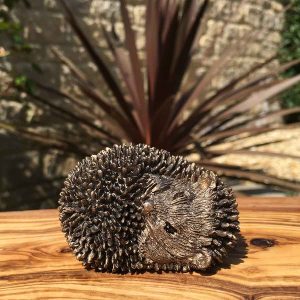 Baby hedgehog Frith sculpture hand finished cold cast bronze ornament. Dizzy Hoglet