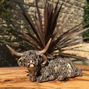 Highland bull sitting and relaxing bronze Frith sculpture by Veronica Ballan