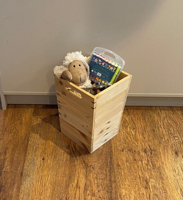 Tall storage crate handmade from recycled wood with carry handles making it perfect as a toy box or log or kindling box