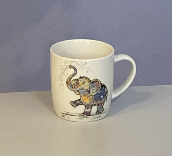 Classic white mug with a cute elephant with a colourful collage decoration. Quirky Eddie elephant Bug Art mug