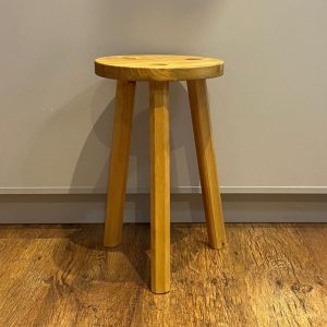 handmade wooden stool or side table with a light oak stain