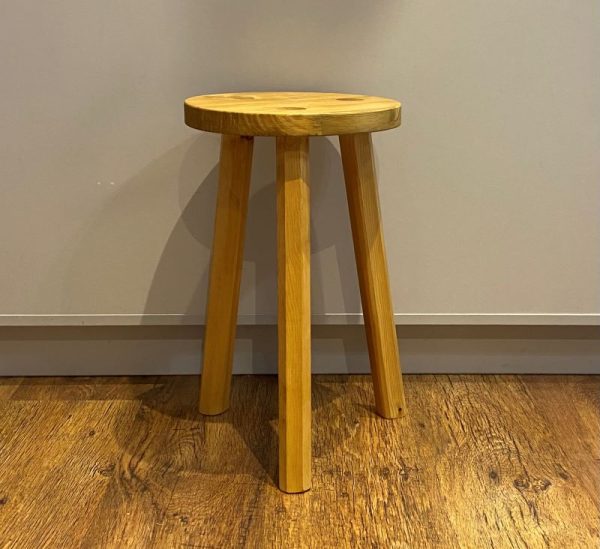 handmade wooden stool or side table with a light oak stain