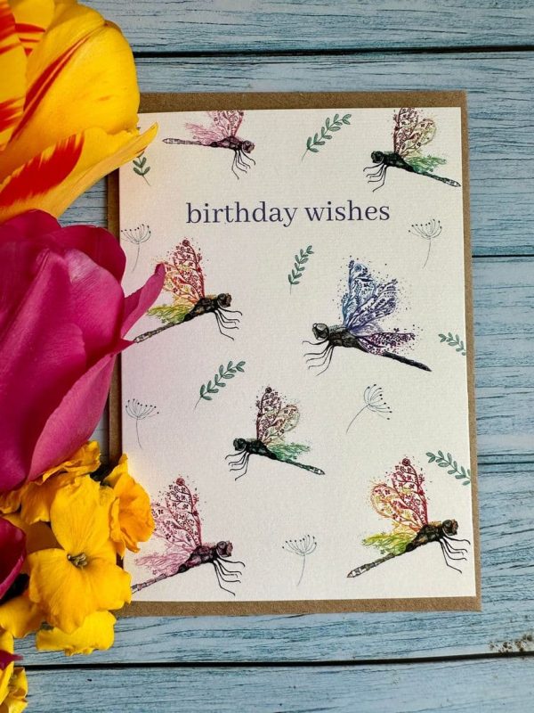 eco birthday card saying birthday wishes and showing multiple dragonflies with colourful multicoloured highlights