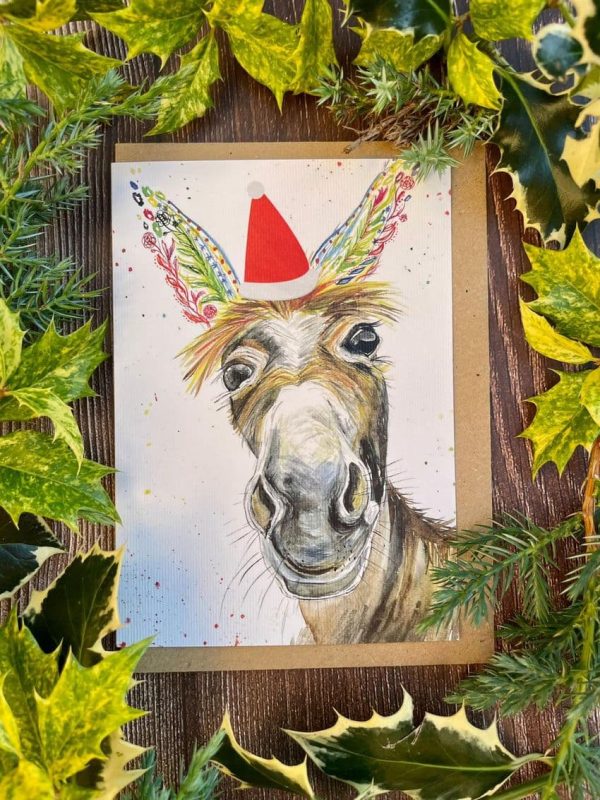 Christmas greetings from Dylan the donkey" eco friendly card with a donkey in a santa hat