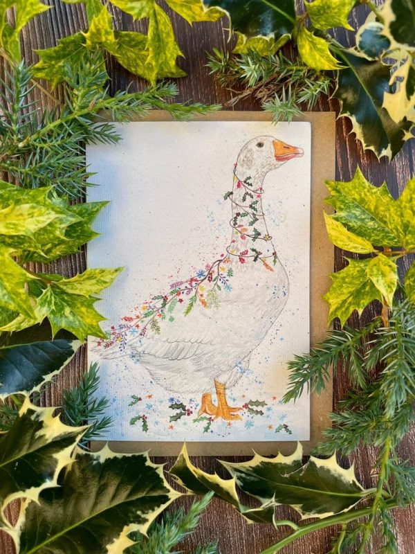 eco friendly Christams card showing a goose with colourful christmas themed embellishments